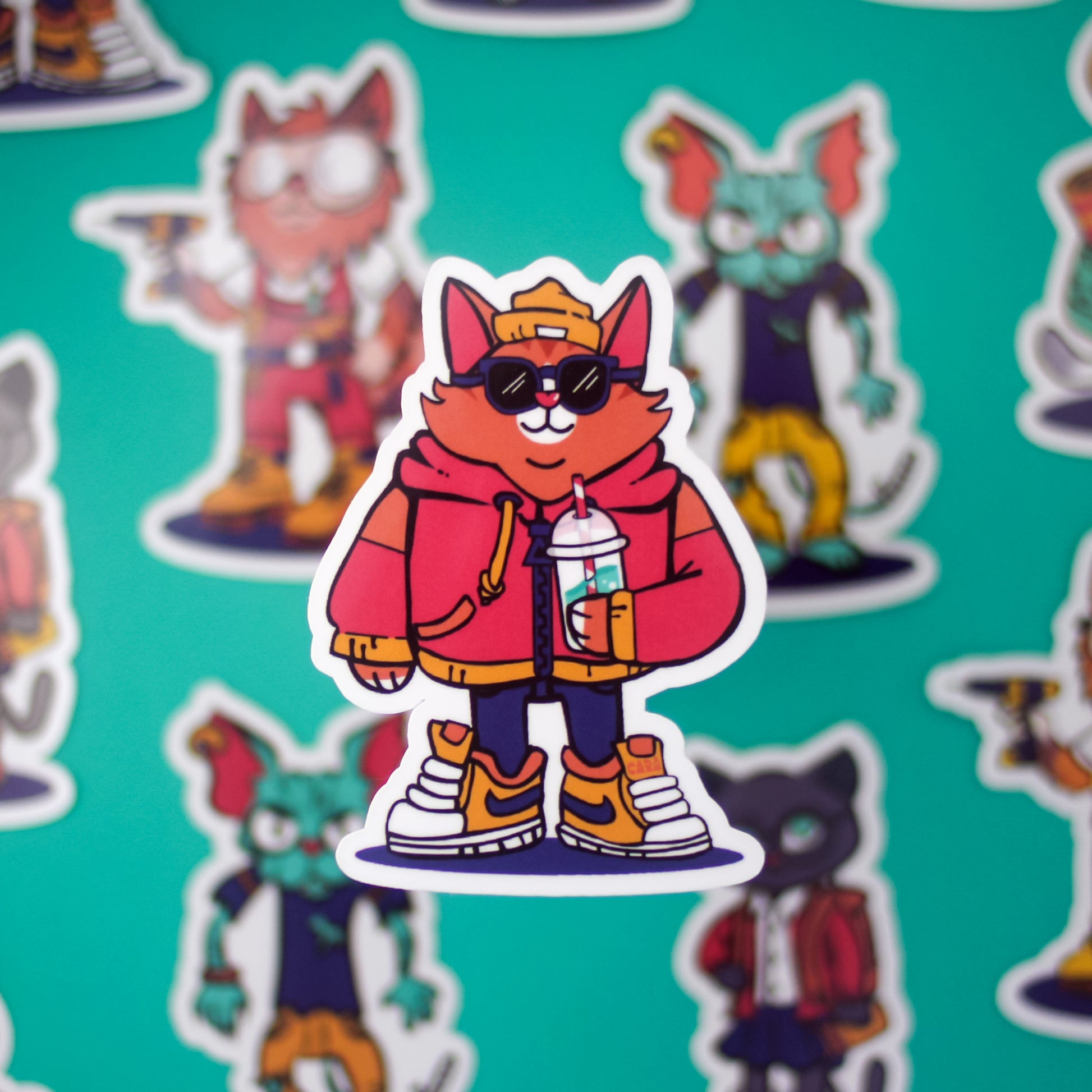 Cartoon cat character wearing a red jacket and sunglasses on a teal background with similar characters.