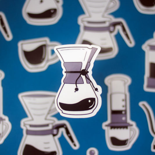 Sticker of a Chemex on a blue background with similar coffee maker designs.