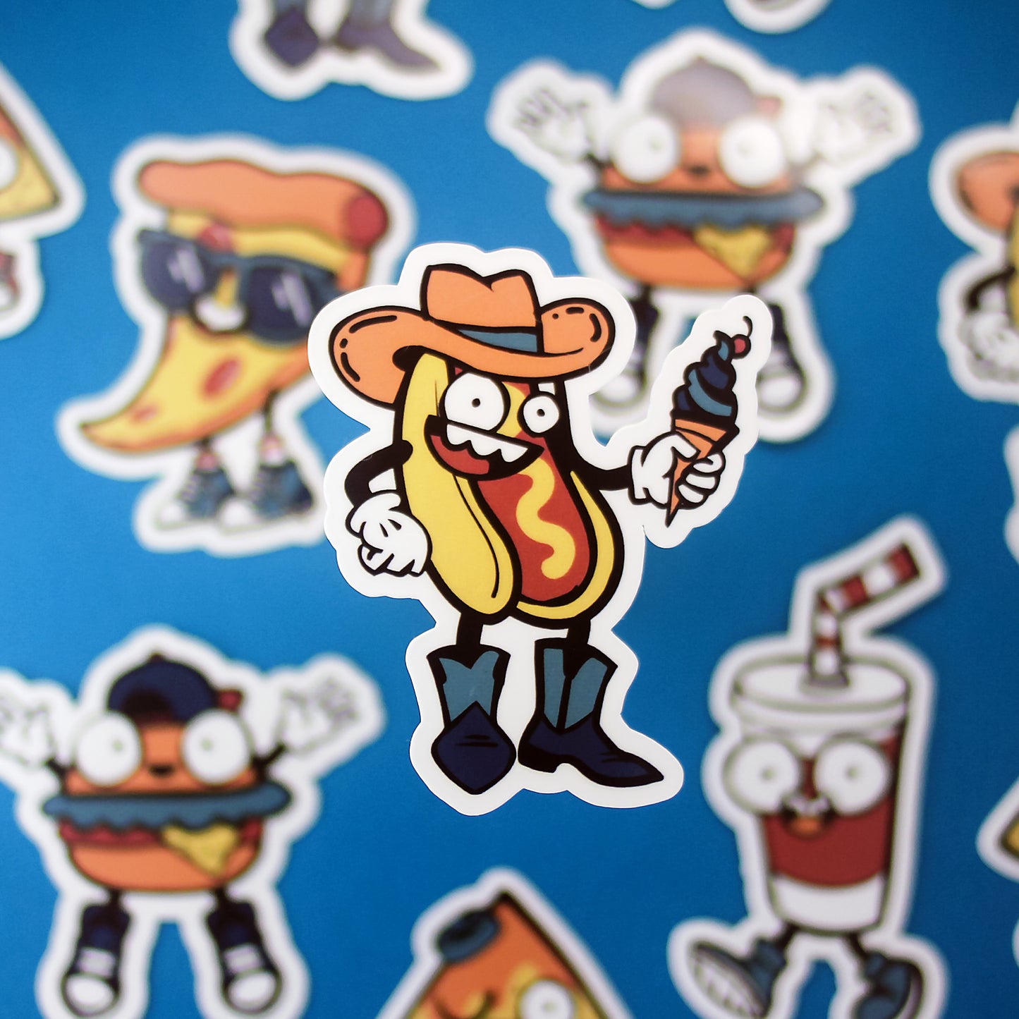 Cartoon hot dog character with a cowboy hat and ice cream cone on a blue background