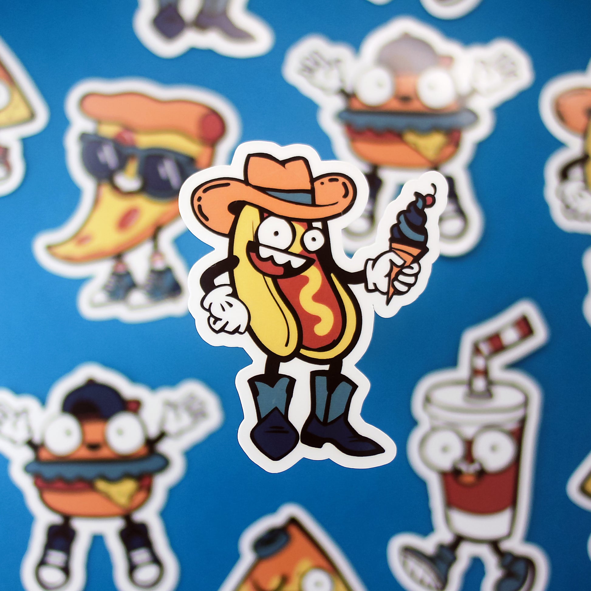 Cartoon hot dog character with a cowboy hat and ice cream cone on a blue background